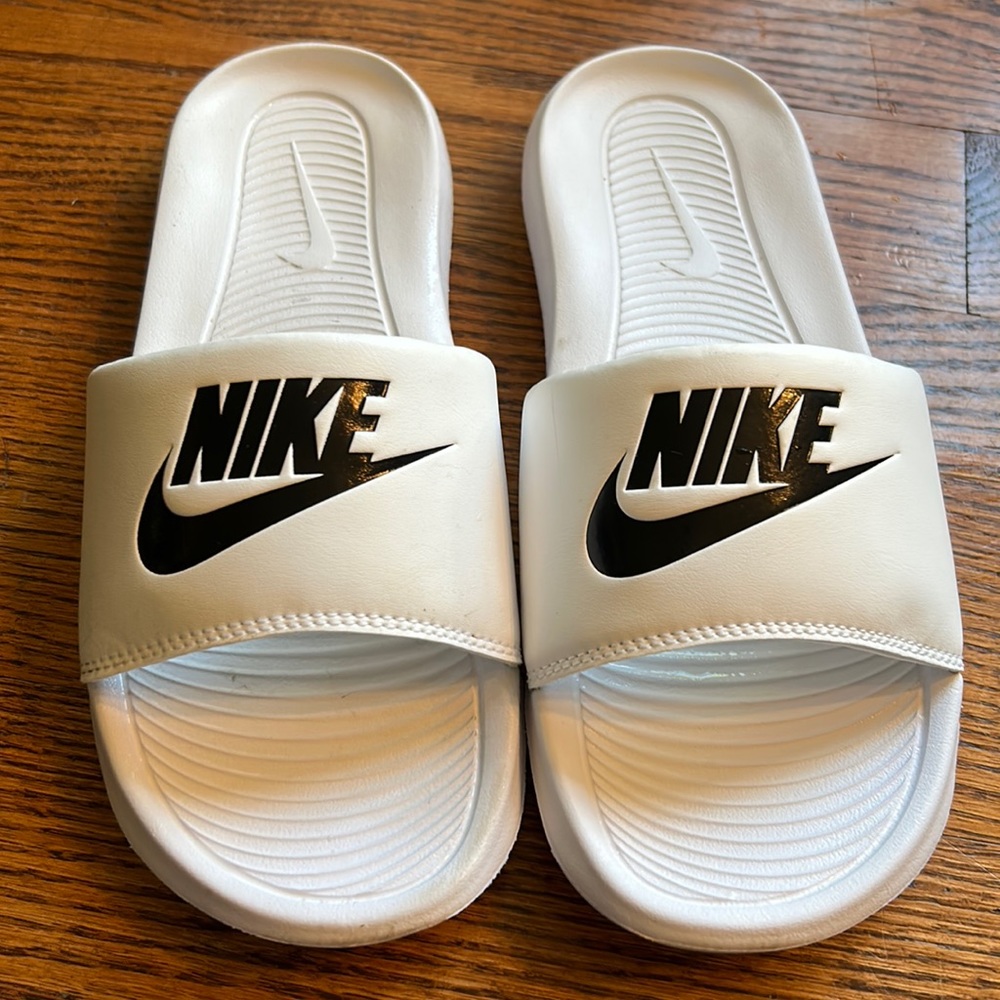 Men’s seven Nike slides
